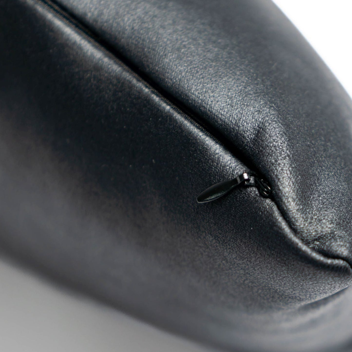 close up shot of the autonomy travel pillow with its zipper showing